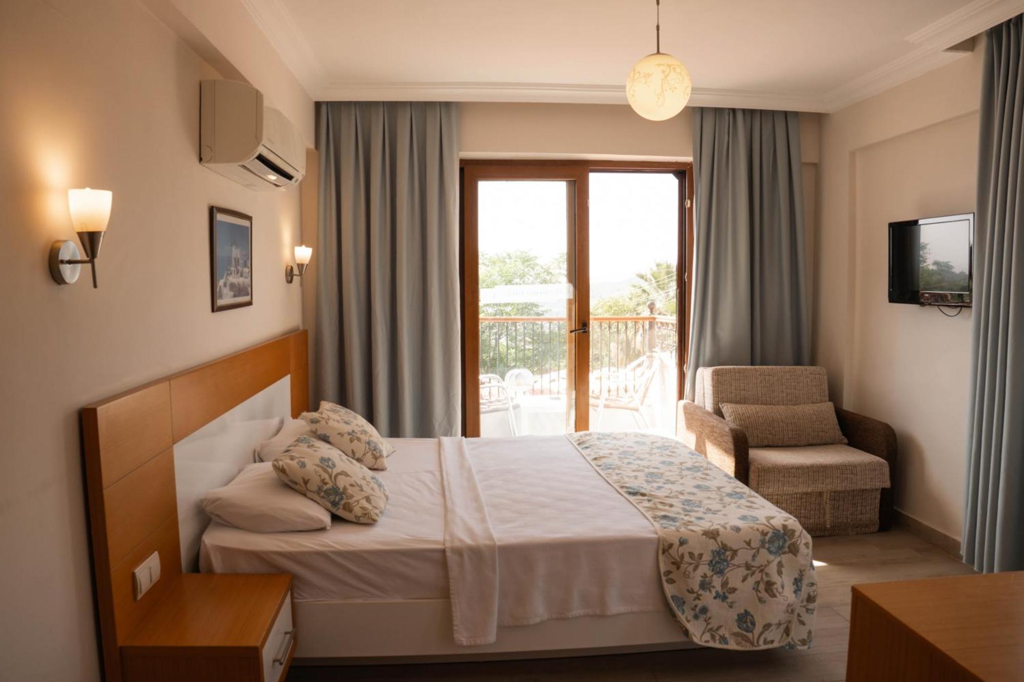 Perdikia Hill Hotel And Villas โอลลุนเดนิซ ภายนอก รูปภาพ