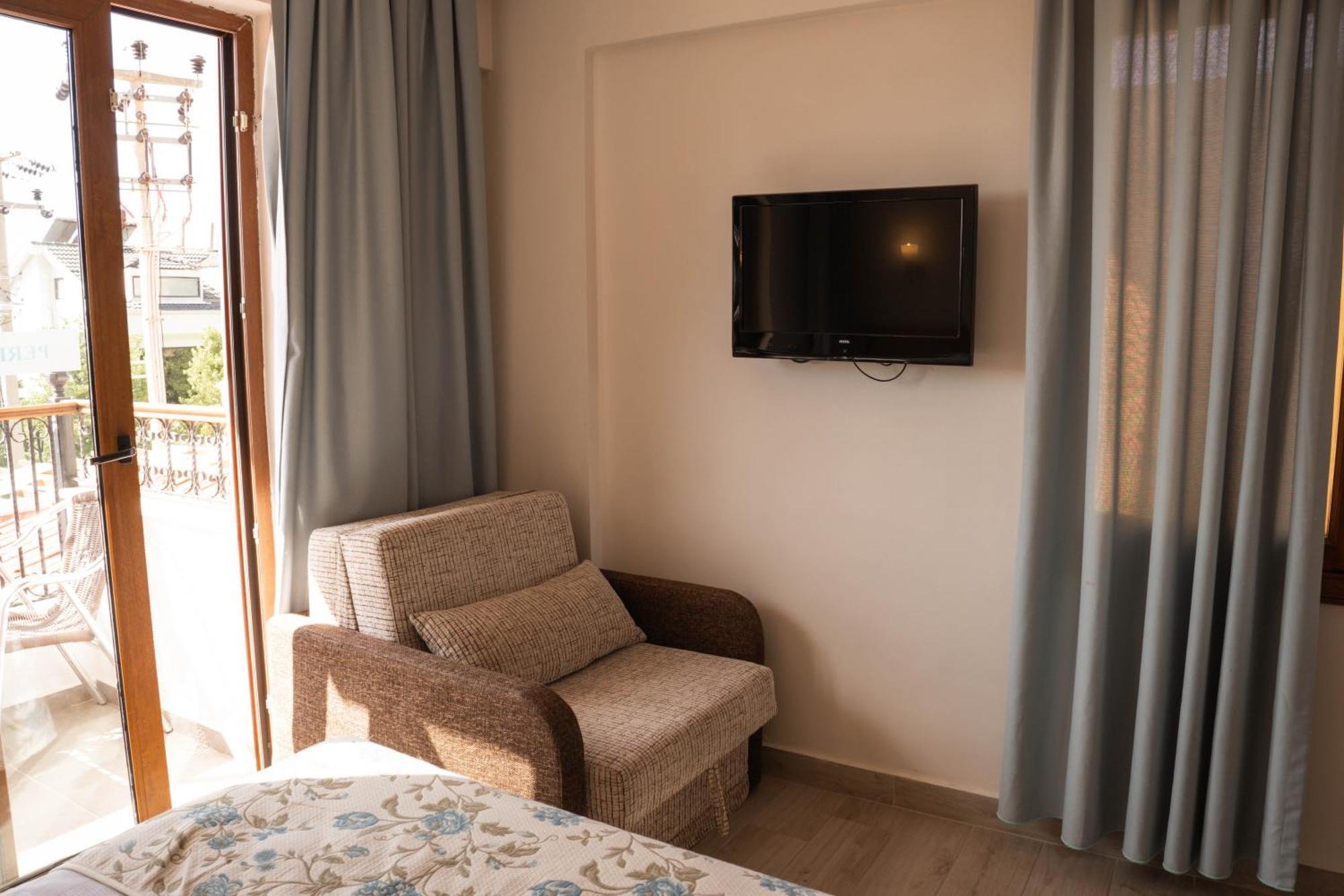 Perdikia Hill Hotel And Villas โอลลุนเดนิซ ภายนอก รูปภาพ