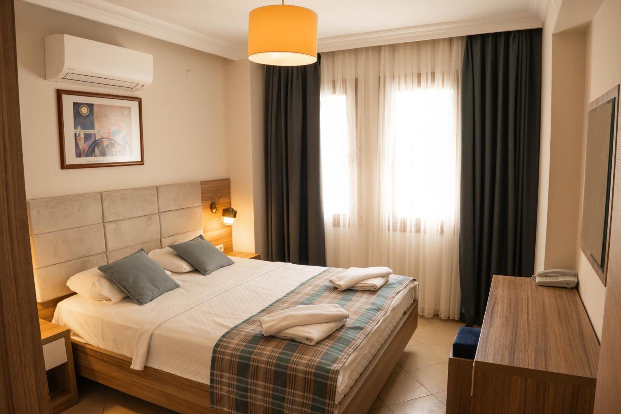 Perdikia Hill Hotel And Villas โอลลุนเดนิซ ภายนอก รูปภาพ