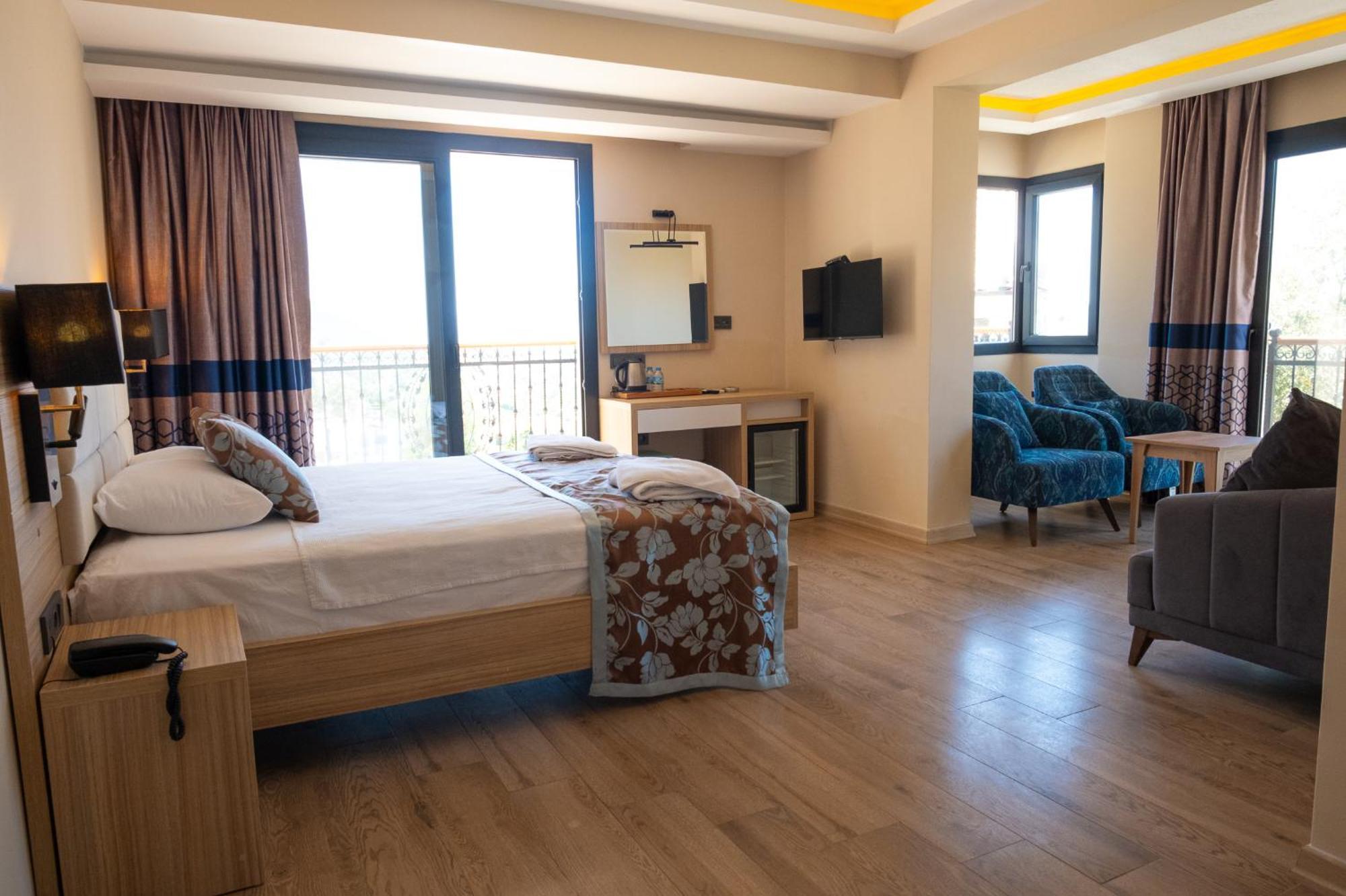 Perdikia Hill Hotel And Villas โอลลุนเดนิซ ภายนอก รูปภาพ